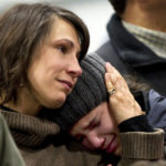 Mother Comforts Daughter