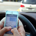 Driver sending a text message