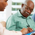 Elderly Couple Consulting Social Worker